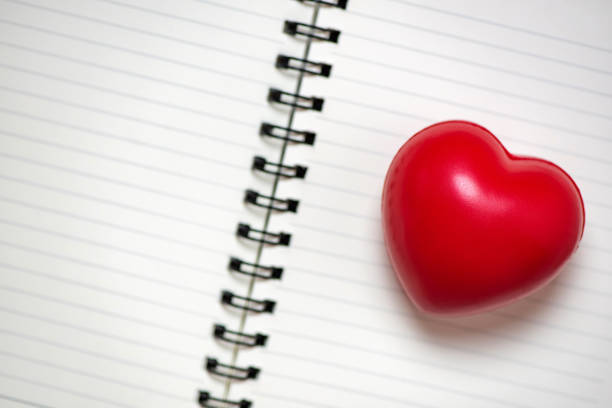istock Ball Red heart on the book, Concept : love reading 1134912920