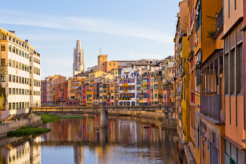 Cityscape with old houses on the riverbank in Girona, Catalonia, Spain
