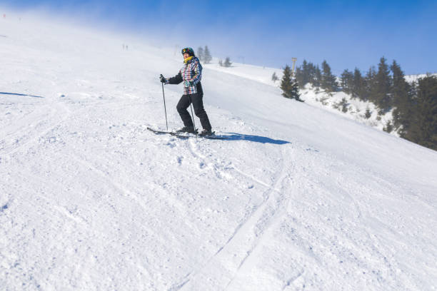 istock Woman on ski slope 1134914594