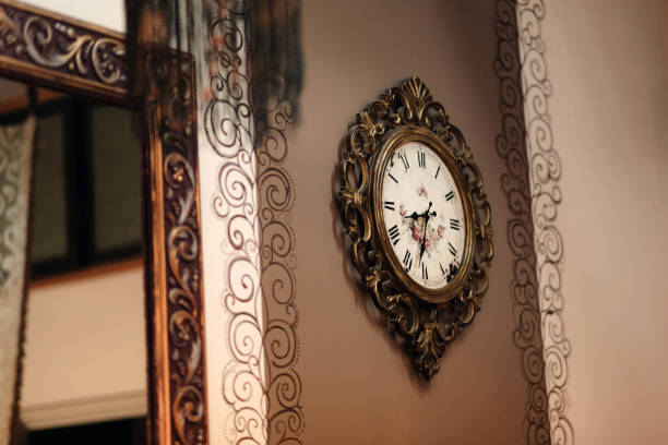 istock Vintage Bronze Wall Clock. Dial with arrows of ancient bronze clock. 1134916934