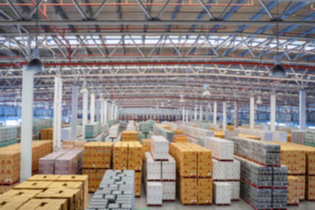 istock Abstract blurred boxes package storage inside warehouse storage or factory 1134917117
