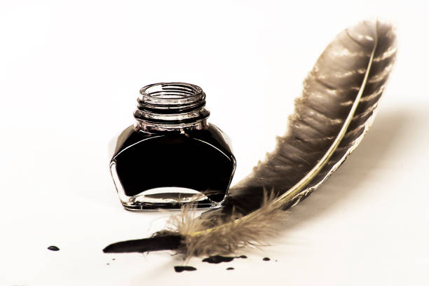 istock Writing concept, pen and inkwell on a white background 1134921211