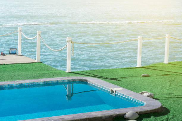 istock swimming pool by the sea 1134924663