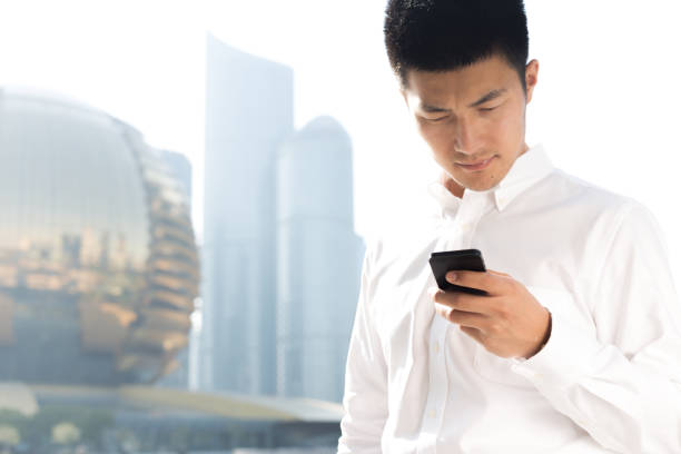 istock asian businessman with mobile phone 1134924782