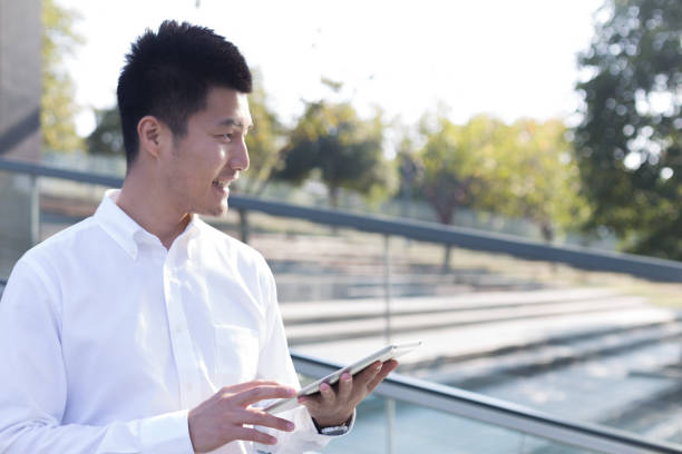 istock asian businessman with mobile phone 1134924890