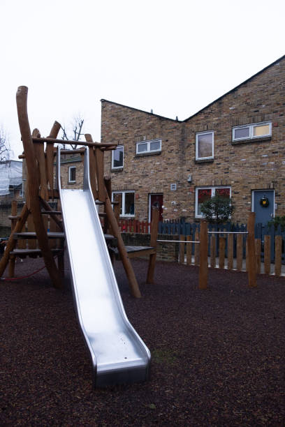 istock Children's slide on a wooden playground 1134928356