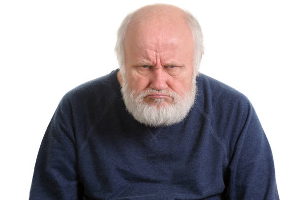 grumpy oldfart or dissatisfied displeased old man isolated portrait grumpy oldfart or dissatisfied and displeased old bald man isolated portrait isolated on white grumpy stock pictures, royalty-free photos & images