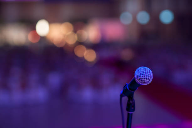 istock microphone in concert hall or conference room soft and blur style for background 1134928491