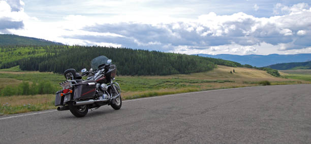 Gunnison, Colorado, 08/26/2008\namerican motorbike parking at winding road