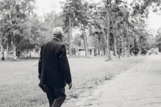istock Senior man walking in a park 1134930068