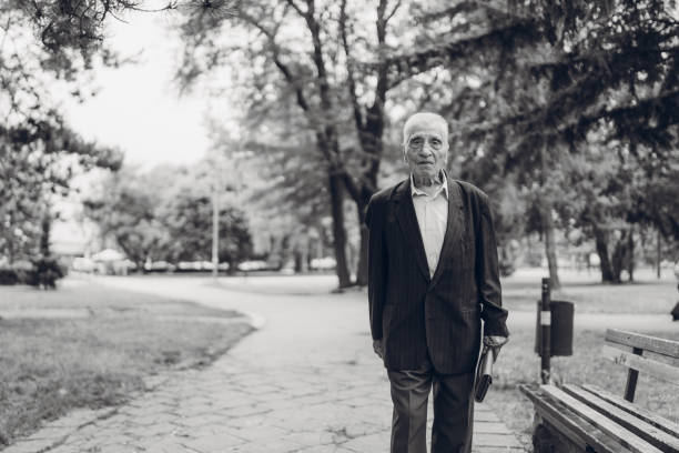 istock Senior man walking in a park 1134930139