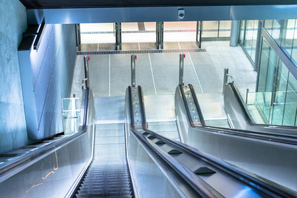 istock Escalators staircase descending into the subway, urban transport infrastructure 1134931057