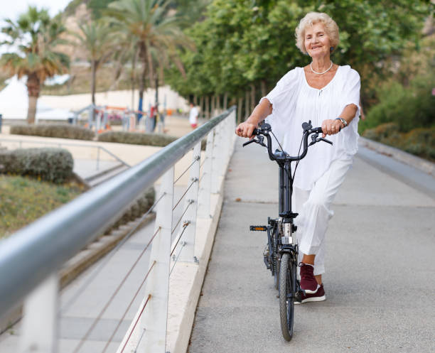 istock Elderly woman going to biking 1134931376