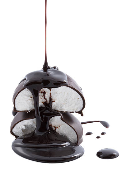 istock chocolate syrup being poured onto marshmallows 113493634