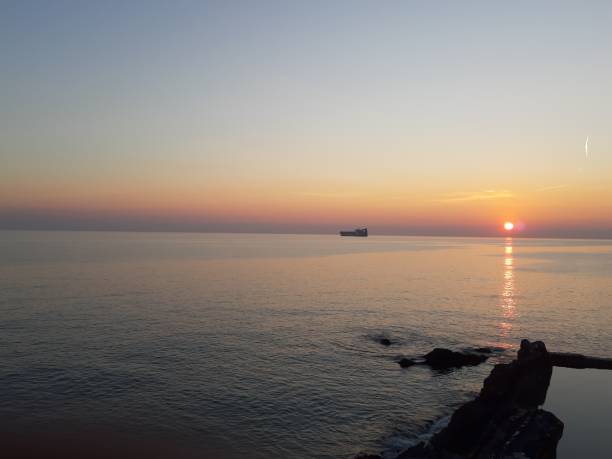 istock Sunset, sea and blue sky 1134938194