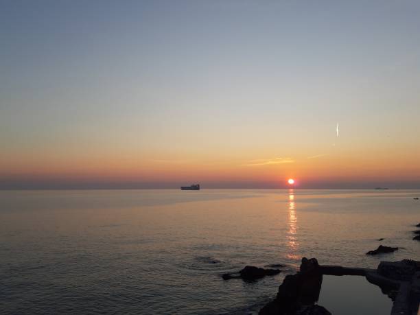 istock Sunset, sea and blue sky 1134938432