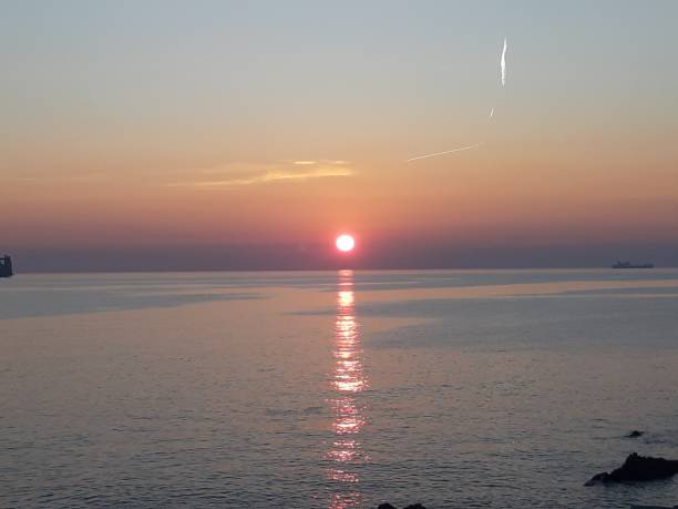 istock Sunset, sea and blue sky 1134938449