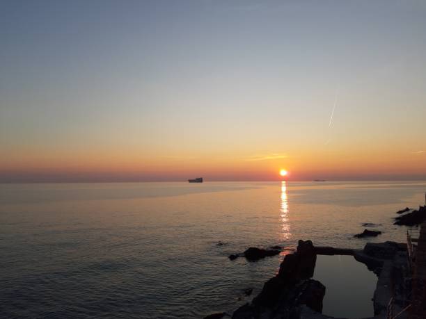 istock Sunset, sea and blue sky 1134938650