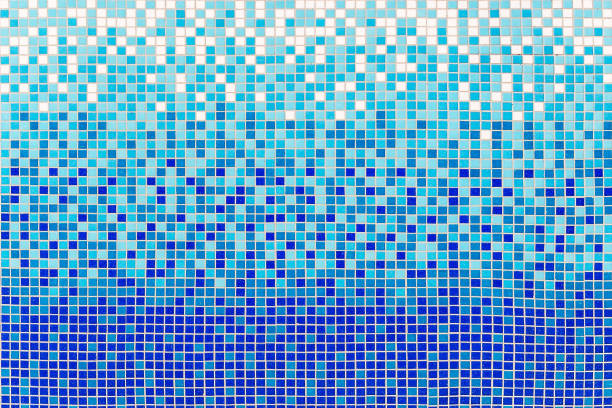istock White blue tile bathroom or pool mosaic. Blue tile wall or floor. Water, bathroom, pool and swimming background. 1134939786
