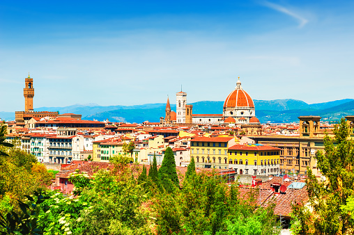 Panoramic view of city center of Florence, Italy. Ancient houses with red roofs and Cathedral Santa Maria del Fiore