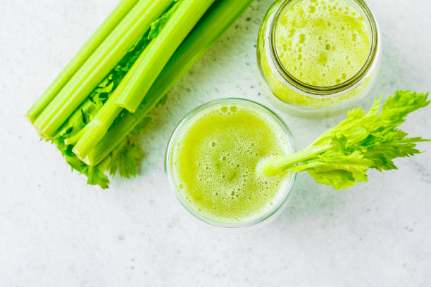 istock Green detox celery juice in a glass. 1134940237
