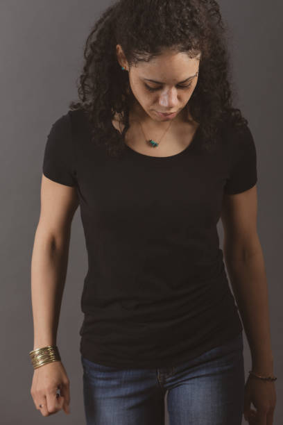istock Serious Mixed Race Woman Looking Down 1134941109