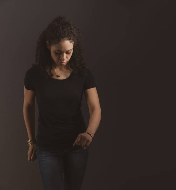 Determined Mixed Race Woman Looking Down Walking
