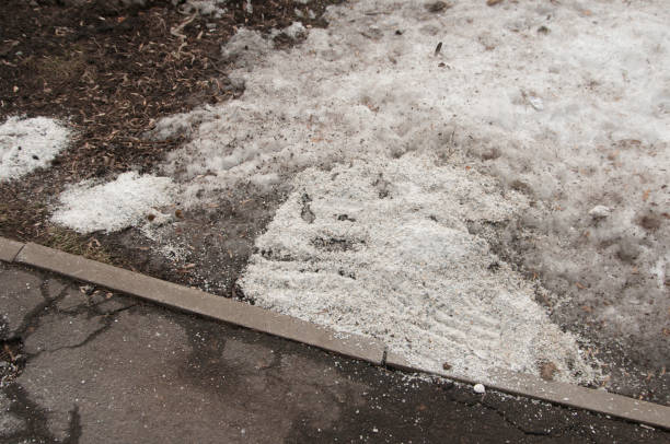 istock Deicing chemicals on asphalt road 1134945734