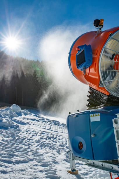 istock Close rear view of a snow machine adding artificial snow on a ski slope 1134948413