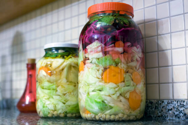 View of two jars of home made mixed pickle.