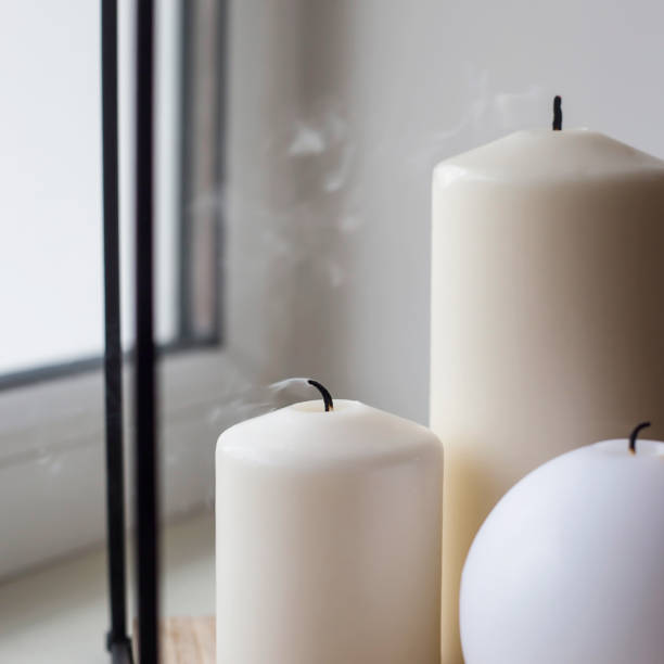 istock White home decor and interior with candles 1134949090
