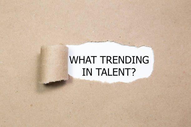 istock WHAT TRENDING IN TALENT? question written under torn paper. - Image 1134950647