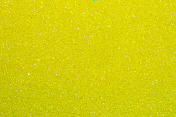 Sponge texture background. Close-up of yellow bath sponge texture with porous structure for background. Macro. Sponge texture background. Close-up of yellow bath sponge texture with porous structure for background. Macro. sponginess stock pictures, royalty-free photos & images
