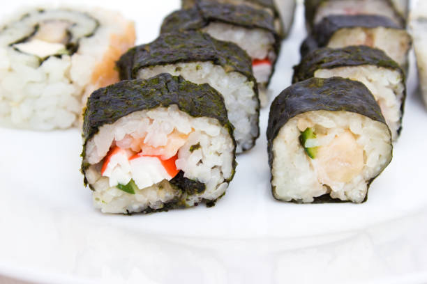 istock Japanese cuisine, rice sushi and fish - closeup 1134954046
