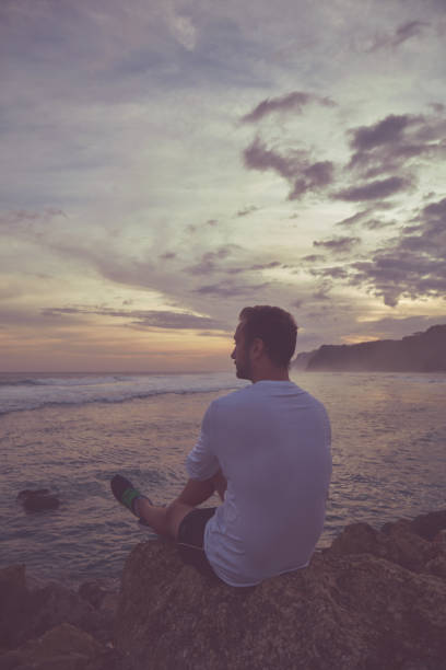 istock Man enjoying on the beach. 1134960822