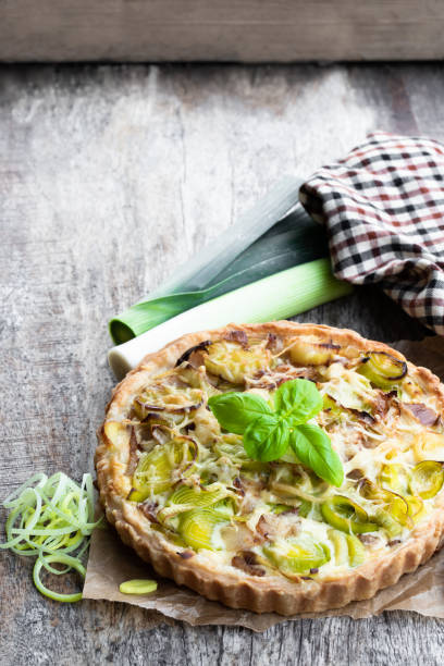 istock Leek tart with bacon and cheese on wooden table 1134961439