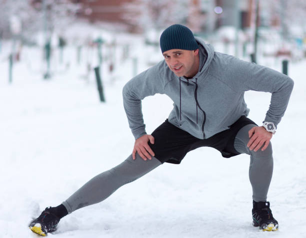 istock a man stretching the muscle on his leg and looking at the camera 1134961952