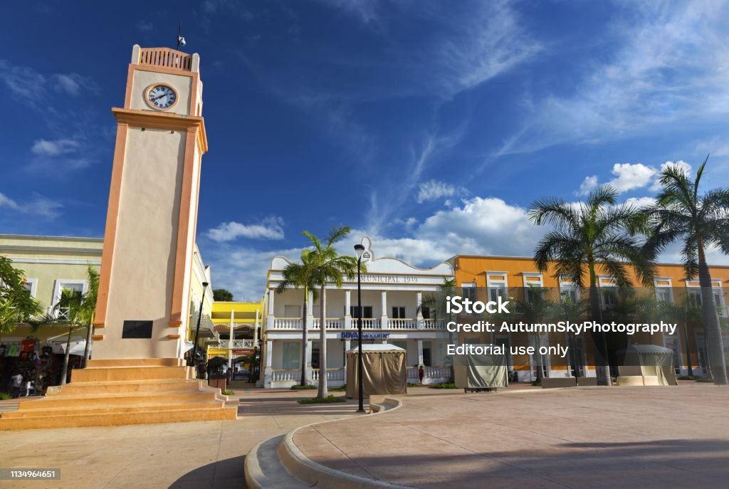 Plaza Del Sol Town Square Tower Clock San Miguel Cozumel Mexico Cozumel, Mexico - December 18, 2018: Plaza Del Sol Town Square and Tower Clock in Downtown San Miguel near Cruise Ship Port Architectural Column Stock Photo