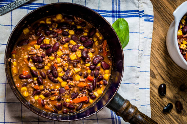 istock Chili corn carne on wood table 1134964939