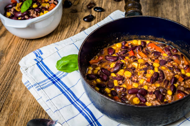 istock Chili corn carne on wood table 1134964943