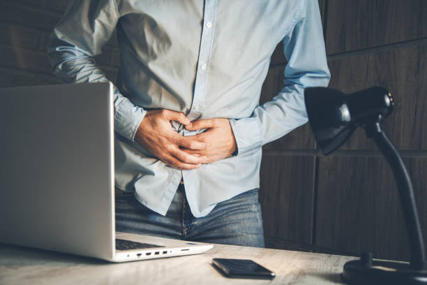 istock Businessman Has Stomach Ache 1134965156