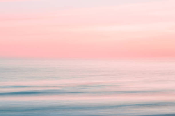 istock Abstract sunrise sky and  ocean nature background with blurred panning motion. 1134966701
