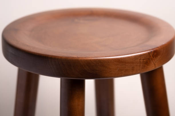 istock Handcrafted dark brown wooden backless stool on white background isolated 1134977616