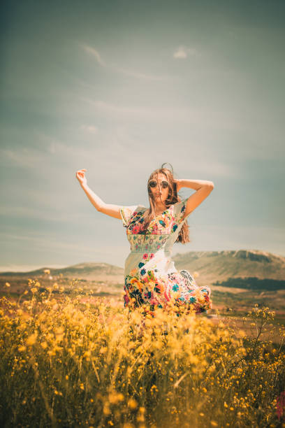 istock female model photography between flowers 1134980045