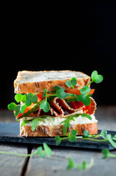 istock Homemade sandwich with whole grain bread and radish sprouts 1134982707