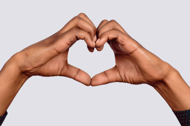 istock Afro American hand make heart shape. 1134984400