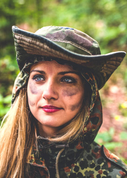 istock Hiking woman in the military uniform 1134986549