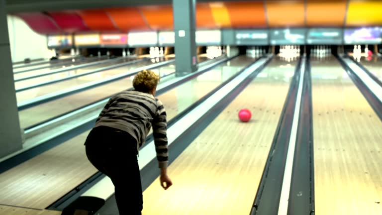 bowling is never too late-senior woman have fun on bowling