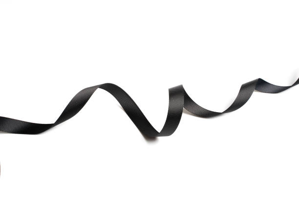 istock beautiful black ribbon twist spiral isolated on white background 1134996246