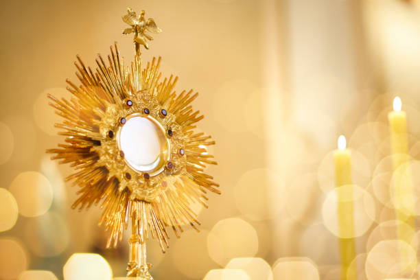 Ostensorial adoration in the catholic church stock photo